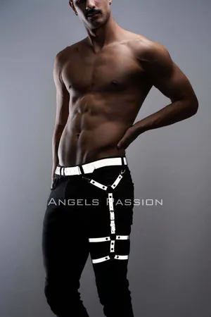 Silver reflective thigh leg harness accessory on black pants