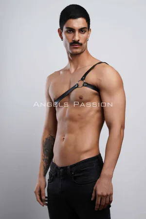 Black faux leather one-shoulder harness with O-ring detail
