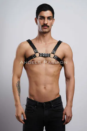 Black faux leather studded chest harness with silver O-ring details