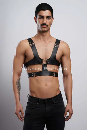 Black faux leather chest harness with O-ring detail and adjustable straps