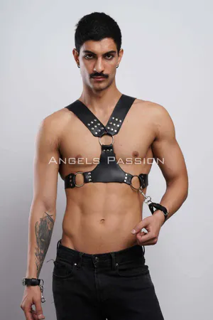 Black faux leather studded chest harness with detachable cuffs