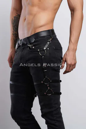 Black faux leather leg harness with adjustable straps and O-rings
