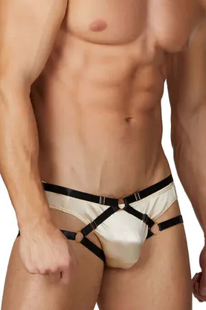 Champagne satin harness brief with black faux leather straps and gold O-ring accents