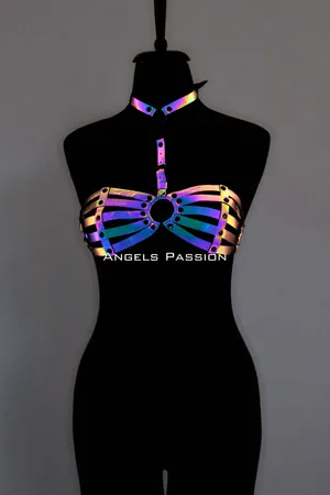 Reflective chest harness with O-ring and matching choker on a mannequin.
