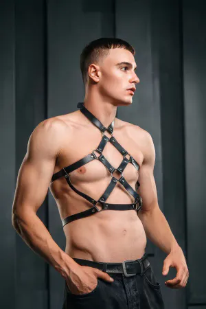 Black faux leather strappy O-ring chest harness with cage detail