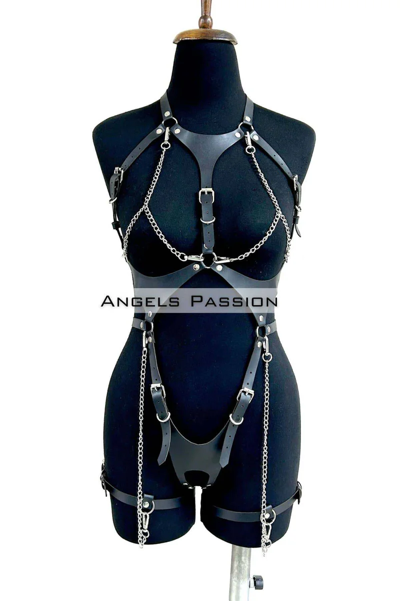 Close-up of adjustable buckle and silver chain hardware on body harness