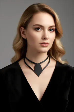 Black faux leather statement choker with V-shape accent worn by a model