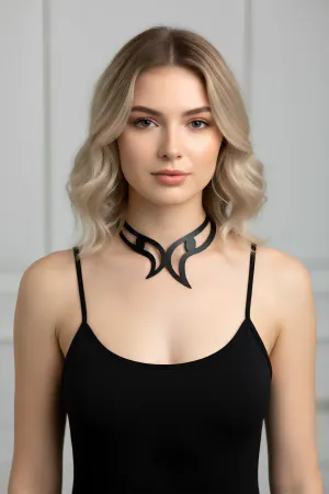 Black sculpted faux leather choker necklace on a model