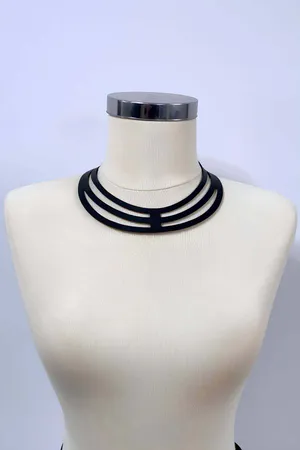 Black vegan leather multi-strap choker harness on mannequin