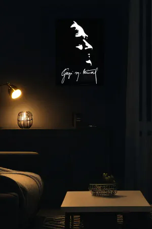 Reflective Ataturk Profile Wall Art with Signature on black faux leather, illuminating in dark setting