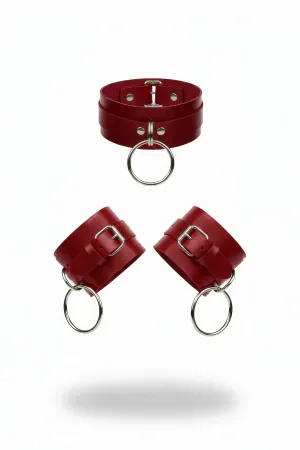 Red faux leather choker and wrist cuffs with silver O-ring details