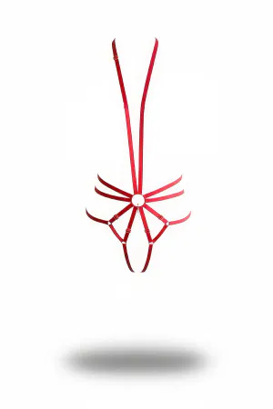 Red strappy body harness with central O-ring and adjustable straps