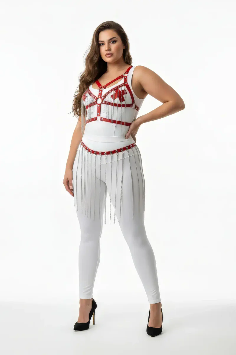 White faux leather body harness with red bust accents and studded fringe skirt