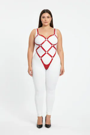 Red vegan leather full body harness with diamond strap pattern and O-ring details