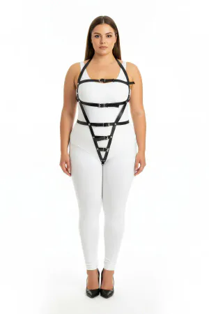 Black vegan leather full body harness with adjustable straps and V-strap design on a model.