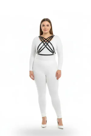 Black faux leather strappy chest harness worn by a plus-size model
