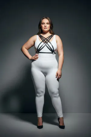 Black faux leather strappy chest harness worn by a plus-size model