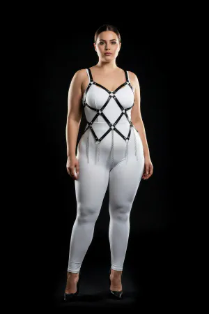 Black faux leather full body harness with diamond lattice and silver chain fringe, worn by a plus-size model