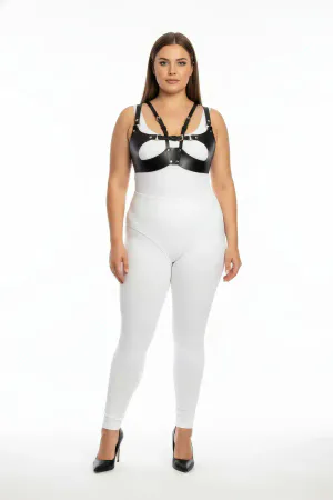 Black faux leather strappy harness bra with central O-ring detail worn by a plus-size model