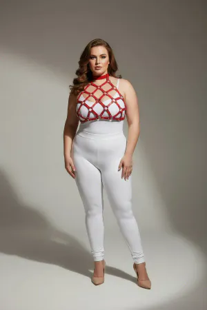 Red geometric cage halter harness with nail details worn by a plus-size model