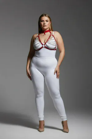 Red faux leather body harness with cascading silver chains and O-ring detail, worn by a plus-size model.