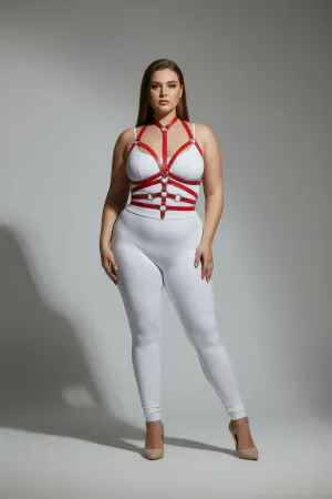 Red faux leather full body harness with adjustable straps and O-ring details