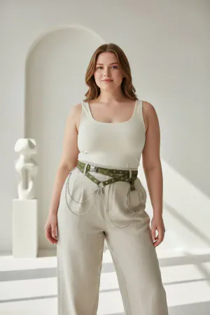 Khaki Faux Leather Belt Harness with Draped Chains and O-Ring on a Woman