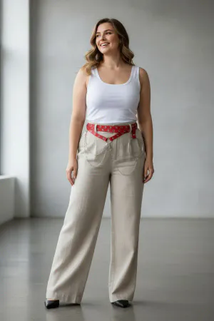 Red Faux Leather Waist Harness with Chains and O-Ring worn over beige pants