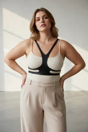 Black Faux Leather Minimalist Chest Harness Overlay for Women over white tank top